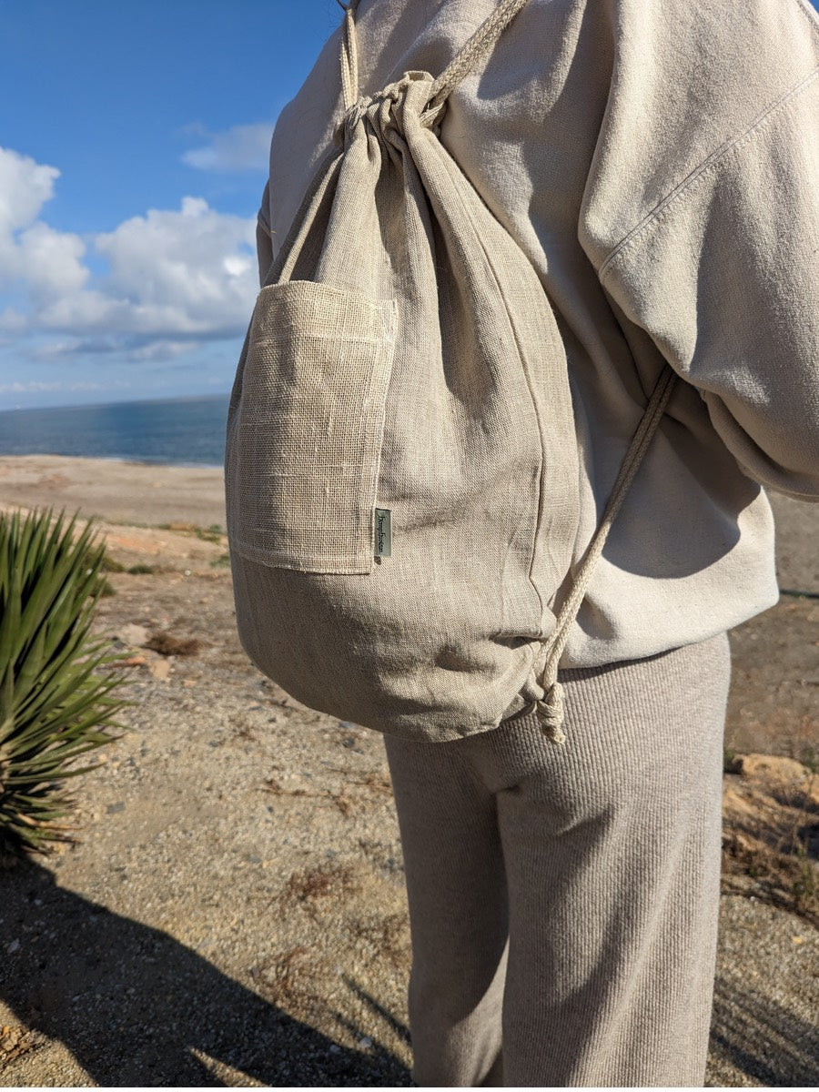 Lanai hemp drawstring bag with pockets.