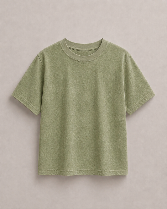 A short-sleeve crewneck t-shirt in a light solive green color, laid flat against a neutral light gray background. Hemp Horizon