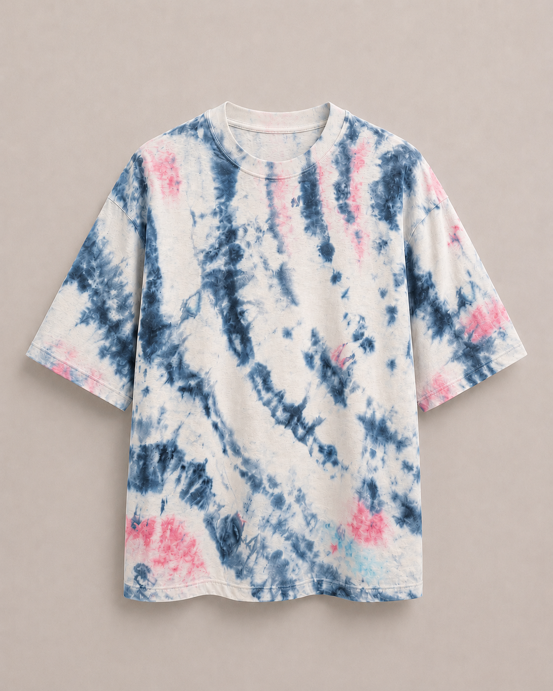 A short-sleeve t-shirt featuring a navy blue and pink ice-dye pattern on a white base, displayed flat against a neutral beige background. Hemp Horizon