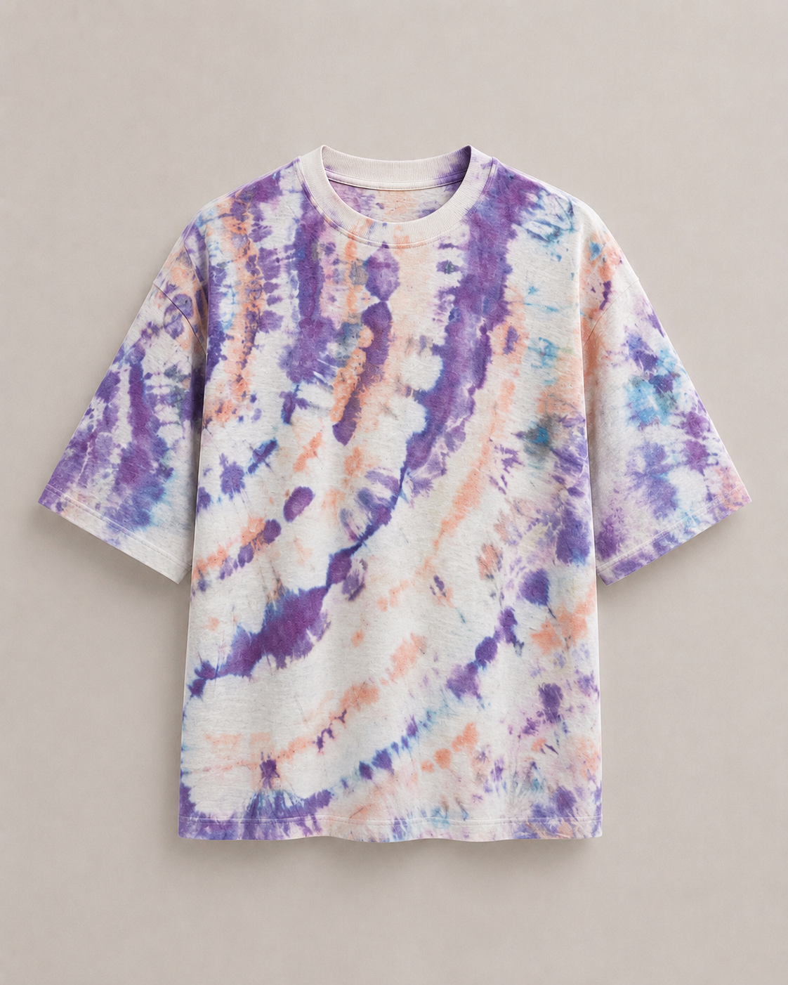 A short-sleeve ice dyed t-shirt with a purple, blue, and orange ice-dye pattern on a white base, displayed flat against a neutral beige background. Hemp Horizon