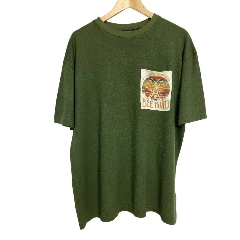 Olive green Bee Kind pocket tee with vintage bee patch in earthy tones